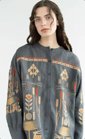 girl in embroidered shirt